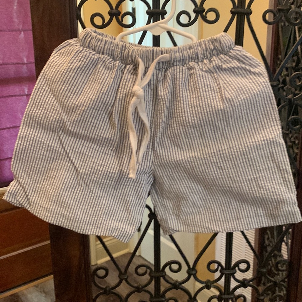 Super cute boys blue and white seersucker swimming shorts. Perfect for summer!!